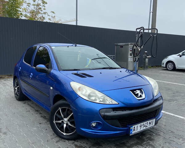 Синий Пежо 206, объемом двигателя 1.36 л и пробегом 197 тыс. км за 3800 $, фото 1 на Automoto.ua