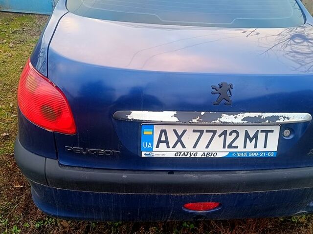 Синий Пежо 206, объемом двигателя 1.4 л и пробегом 230 тыс. км за 700 $, фото 1 на Automoto.ua