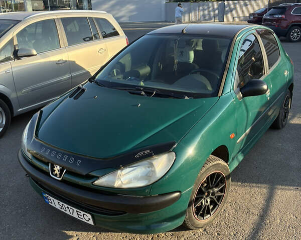 Зеленый Пежо 206, объемом двигателя 1.1 л и пробегом 323 тыс. км за 2000 $, фото 1 на Automoto.ua