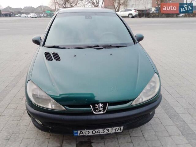 Зеленый Пежо 206, объемом двигателя 1.59 л и пробегом 237 тыс. км за 2300 $, фото 1 на Automoto.ua