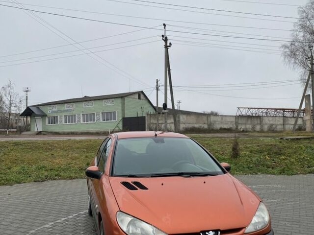Помаранчевий Пежо 206, об'ємом двигуна 1.4 л та пробігом 143 тис. км за 2000 $, фото 1 на Automoto.ua