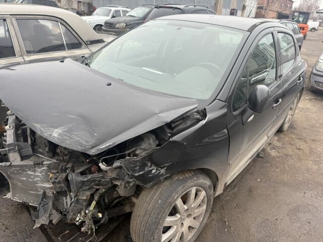 Черный Пежо 207, объемом двигателя 1.6 л и пробегом 100 тыс. км за 1700 $, фото 1 на Automoto.ua