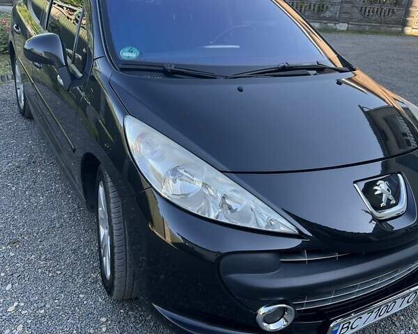 Черный Пежо 207, объемом двигателя 1.6 л и пробегом 260 тыс. км за 5800 $, фото 1 на Automoto.ua
