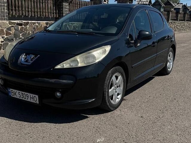 Черный Пежо 207, объемом двигателя 1.6 л и пробегом 149 тыс. км за 3500 $, фото 1 на Automoto.ua