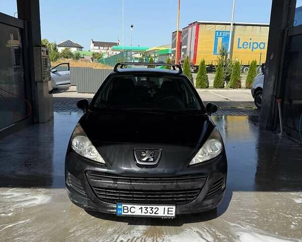 Черный Пежо 207, объемом двигателя 1.36 л и пробегом 144 тыс. км за 5700 $, фото 1 на Automoto.ua