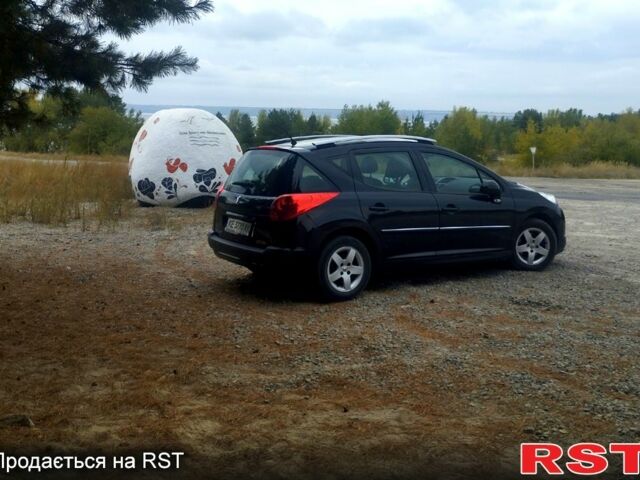 Черный Пежо 207, объемом двигателя 1.4 л и пробегом 225 тыс. км за 5500 $, фото 1 на Automoto.ua