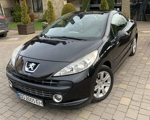 Черный Пежо 207, объемом двигателя 1.6 л и пробегом 200 тыс. км за 5500 $, фото 1 на Automoto.ua