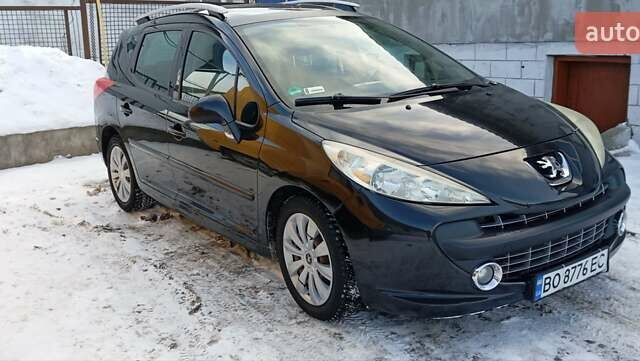 Черный Пежо 207, объемом двигателя 1.6 л и пробегом 270 тыс. км за 4700 $, фото 1 на Automoto.ua