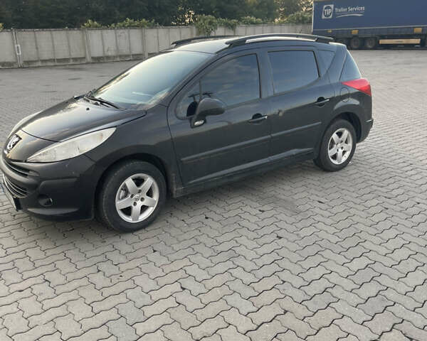 Черный Пежо 207, объемом двигателя 1.36 л и пробегом 243 тыс. км за 3200 $, фото 1 на Automoto.ua