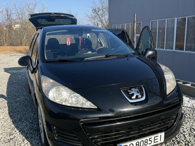 Черный Пежо 207, объемом двигателя 1.6 л и пробегом 270 тыс. км за 5600 $, фото 1 на Automoto.ua