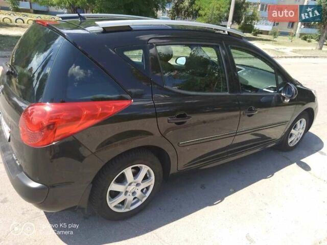 Черный Пежо 207, объемом двигателя 1.6 л и пробегом 190 тыс. км за 6800 $, фото 1 на Automoto.ua