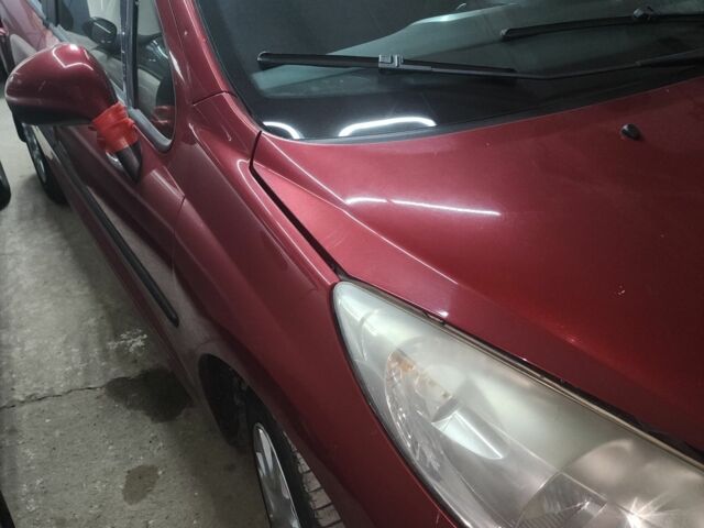 Красный Пежо 207, объемом двигателя 1.4 л и пробегом 187 тыс. км за 4600 $, фото 1 на Automoto.ua