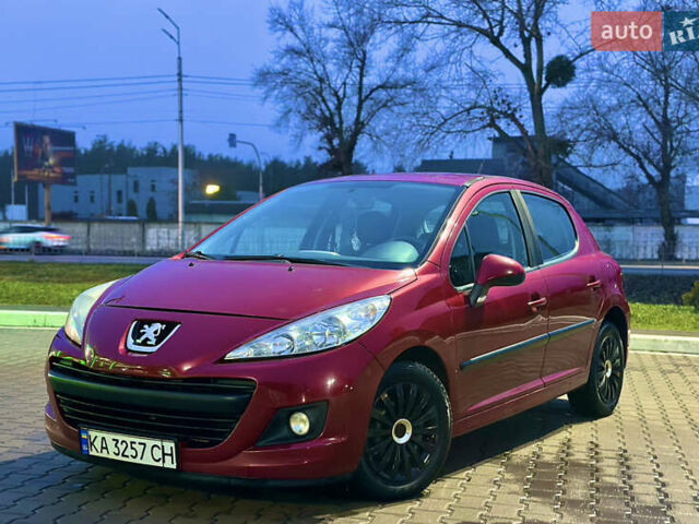 Красный Пежо 207, объемом двигателя 1.36 л и пробегом 140 тыс. км за 5300 $, фото 1 на Automoto.ua