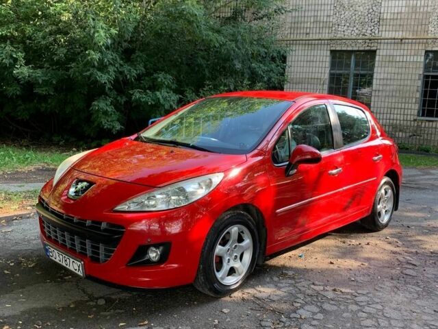 Красный Пежо 207, объемом двигателя 1.4 л и пробегом 150 тыс. км за 5500 $, фото 1 на Automoto.ua