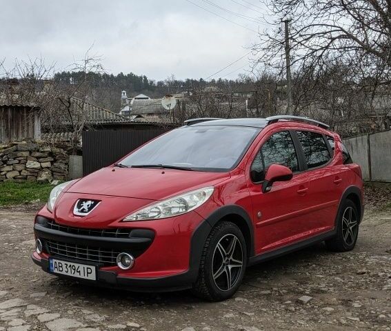 Красный Пежо 207, объемом двигателя 1.6 л и пробегом 230 тыс. км за 5300 $, фото 1 на Automoto.ua