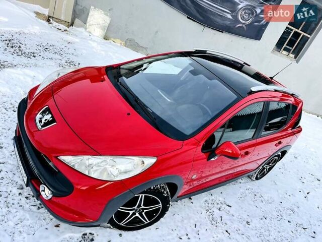 Красный Пежо 207, объемом двигателя 1.6 л и пробегом 231 тыс. км за 5450 $, фото 1 на Automoto.ua