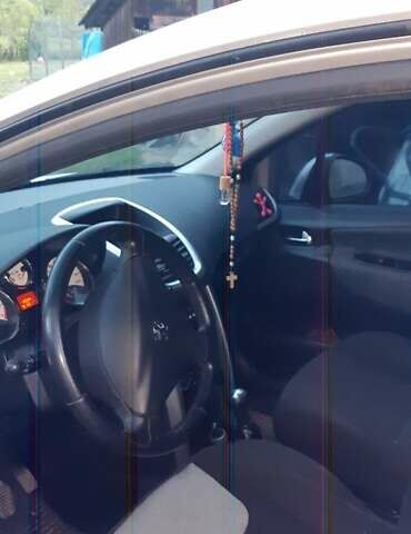 Серый Пежо 207, объемом двигателя 1.4 л и пробегом 192 тыс. км за 3900 $, фото 1 на Automoto.ua