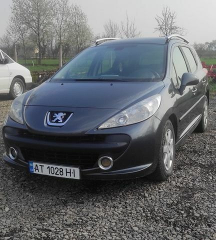 Серый Пежо 207, объемом двигателя 1.6 л и пробегом 277 тыс. км за 4800 $, фото 1 на Automoto.ua