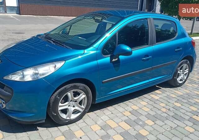 Синий Пежо 207, объемом двигателя 1.4 л и пробегом 238 тыс. км за 5750 $, фото 1 на Automoto.ua
