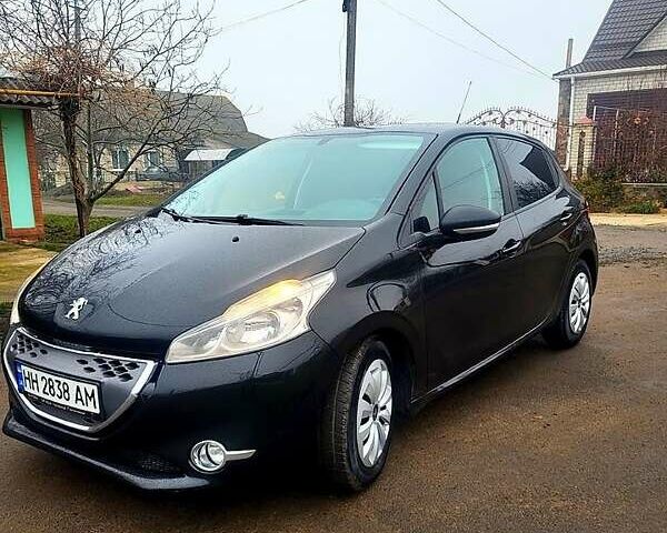Черный Пежо 208, объемом двигателя 1.4 л и пробегом 25 тыс. км за 7500 $, фото 1 на Automoto.ua