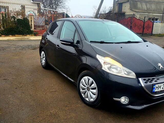 Черный Пежо 208, объемом двигателя 1.4 л и пробегом 25300 тыс. км за 7500 $, фото 1 на Automoto.ua
