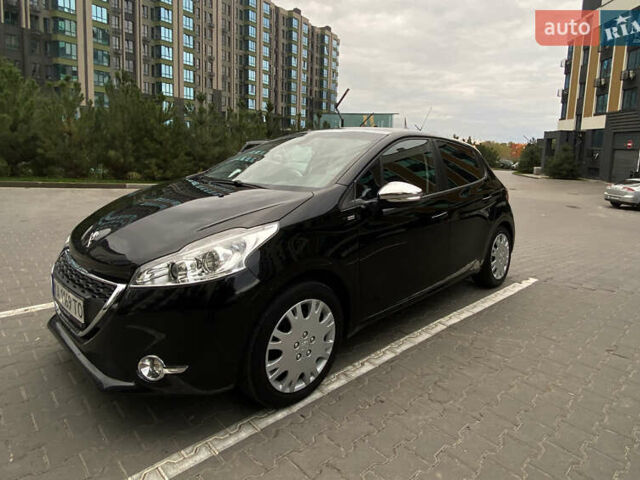 Черный Пежо 208, объемом двигателя 1.2 л и пробегом 117 тыс. км за 6900 $, фото 1 на Automoto.ua