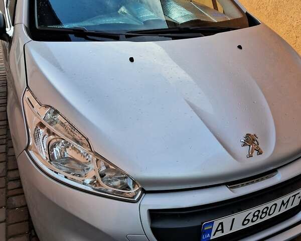 Серый Пежо 208, объемом двигателя 1.56 л и пробегом 159 тыс. км за 8200 $, фото 1 на Automoto.ua