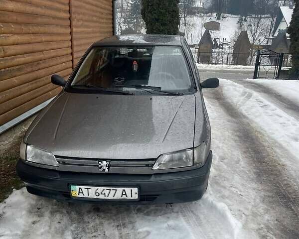 Сірий Пежо 306, об'ємом двигуна 1.36 л та пробігом 365 тис. км за 750 $, фото 1 на Automoto.ua