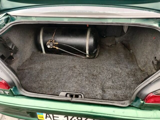 Зеленый Пежо 306, объемом двигателя 1.4 л и пробегом 457 тыс. км за 1700 $, фото 1 на Automoto.ua