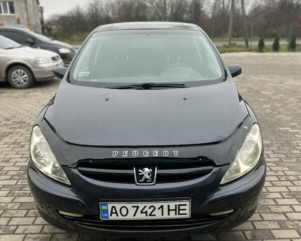 Черный Пежо 307, объемом двигателя 1.4 л и пробегом 300 тыс. км за 2500 $, фото 1 на Automoto.ua