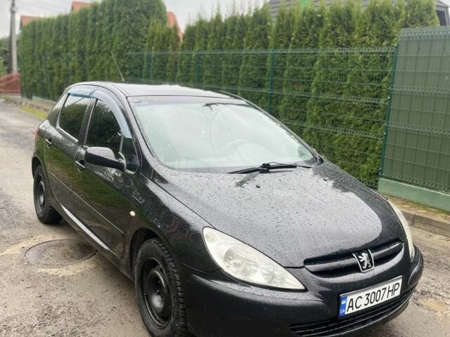 Чорний Пежо 307, об'ємом двигуна 1.4 л та пробігом 245 тис. км за 3000 $, фото 1 на Automoto.ua