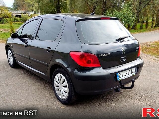 Чорний Пежо 307, об'ємом двигуна 2 л та пробігом 300 тис. км за 3700 $, фото 1 на Automoto.ua