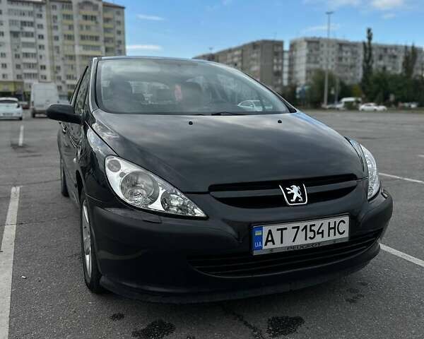 Черный Пежо 307, объемом двигателя 1.59 л и пробегом 280 тыс. км за 4100 $, фото 1 на Automoto.ua