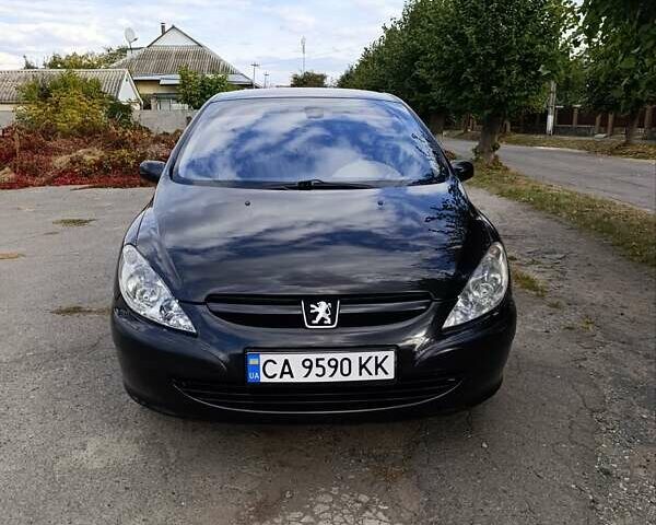 Черный Пежо 307, объемом двигателя 1.59 л и пробегом 380 тыс. км за 4500 $, фото 1 на Automoto.ua