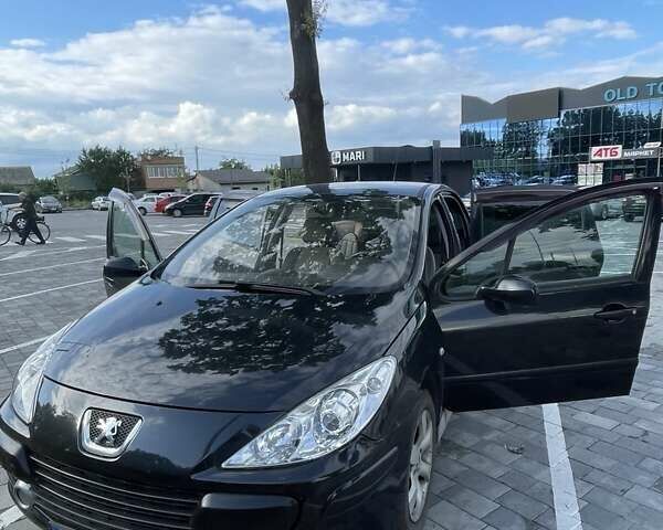 Чорний Пежо 307, об'ємом двигуна 2 л та пробігом 258 тис. км за 5200 $, фото 1 на Automoto.ua