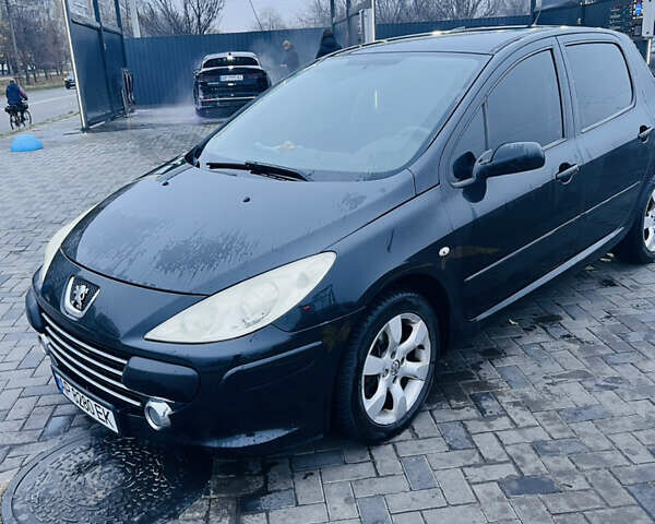 Черный Пежо 307, объемом двигателя 2 л и пробегом 219 тыс. км за 3600 $, фото 1 на Automoto.ua