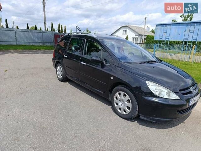 Черный Пежо 307, объемом двигателя 1.59 л и пробегом 227 тыс. км за 4500 $, фото 1 на Automoto.ua