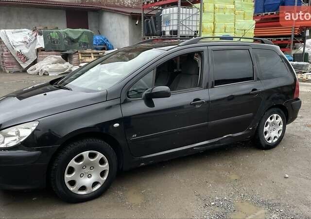 Чорний Пежо 307, об'ємом двигуна 1.4 л та пробігом 385 тис. км за 3350 $, фото 1 на Automoto.ua