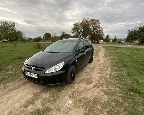 Черный Пежо 307, объемом двигателя 2 л и пробегом 258 тыс. км за 3300 $, фото 1 на Automoto.ua