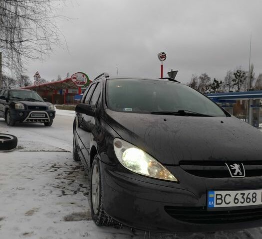 Чорний Пежо 307, об'ємом двигуна 2 л та пробігом 245 тис. км за 5250 $, фото 1 на Automoto.ua