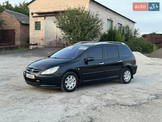 Черный Пежо 307, объемом двигателя 1.6 л и пробегом 202 тыс. км за 3950 $, фото 1 на Automoto.ua