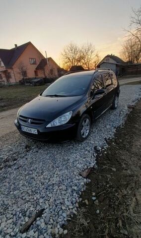 Черный Пежо 307, объемом двигателя 2 л и пробегом 305 тыс. км за 2999 $, фото 1 на Automoto.ua