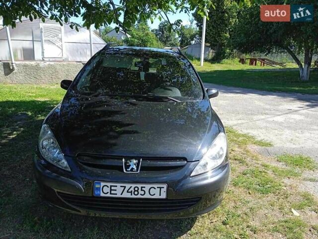 Черный Пежо 307, объемом двигателя 1.4 л и пробегом 228 тыс. км за 3900 $, фото 1 на Automoto.ua