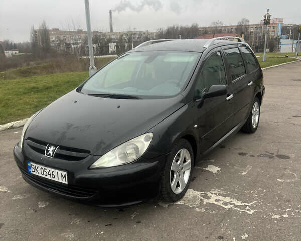 Черный Пежо 307, объемом двигателя 1.56 л и пробегом 285 тыс. км за 4200 $, фото 1 на Automoto.ua