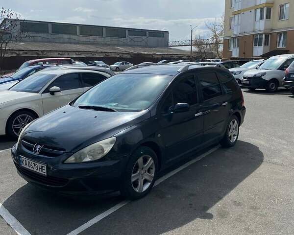Черный Пежо 307, объемом двигателя 1.6 л и пробегом 204 тыс. км за 4800 $, фото 1 на Automoto.ua