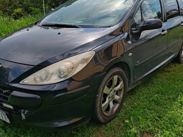 Черный Пежо 307, объемом двигателя 1.6 л и пробегом 375 тыс. км за 2800 $, фото 1 на Automoto.ua