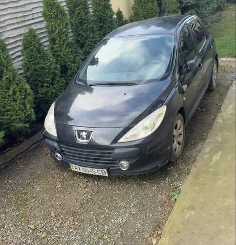 Черный Пежо 307, объемом двигателя 2 л и пробегом 10 тыс. км за 3906 $, фото 1 на Automoto.ua