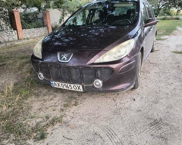 Фиолетовый Пежо 307, объемом двигателя 2 л и пробегом 200 тыс. км за 4500 $, фото 1 на Automoto.ua