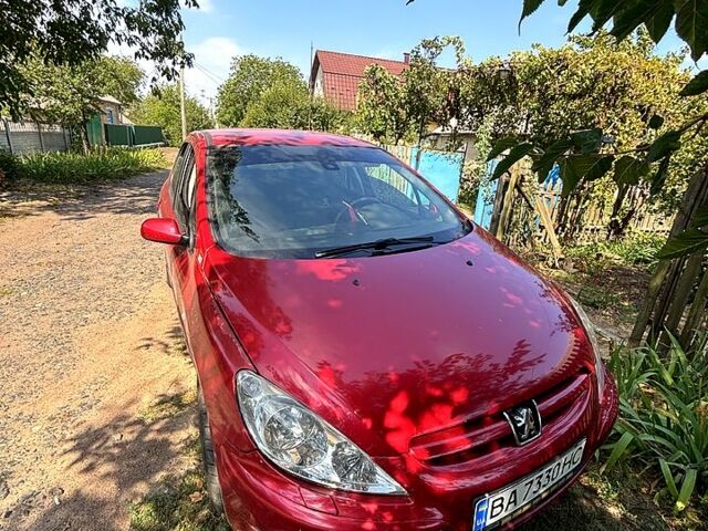 Червоний Пежо 307, об'ємом двигуна 2 л та пробігом 230 тис. км за 3200 $, фото 1 на Automoto.ua