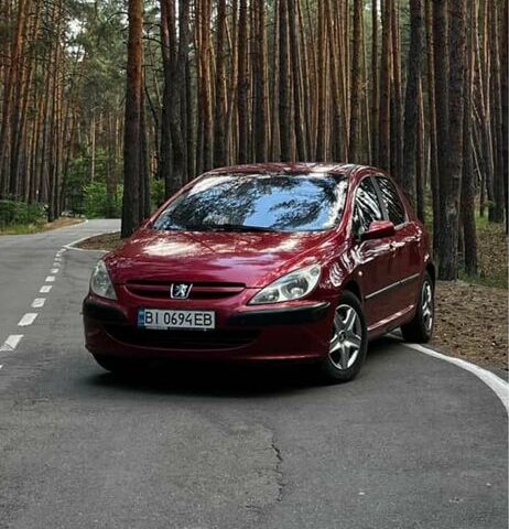 Червоний Пежо 307, об'ємом двигуна 1.4 л та пробігом 199 тис. км за 2900 $, фото 1 на Automoto.ua